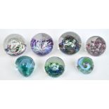 Five Selkirk limited edition glass paperweights and two Caithness examples (7). CONDITION REPORT: