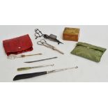 A small quantity of collectors' items including a patent wick trimmer, button hooks, a bodkin,