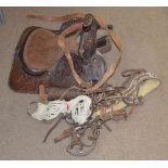 A vintage Western leather Simco saddle no.3100, with bridle and tack.