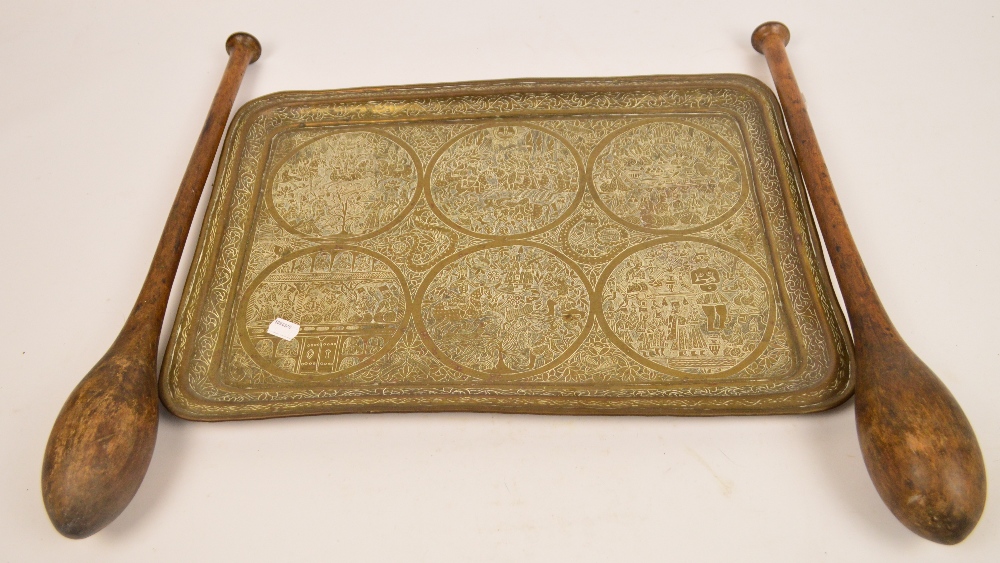 An Eastern rounded rectangular engraved brass tray, width 52.