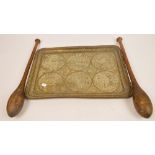 An Eastern rounded rectangular engraved brass tray, width 52.