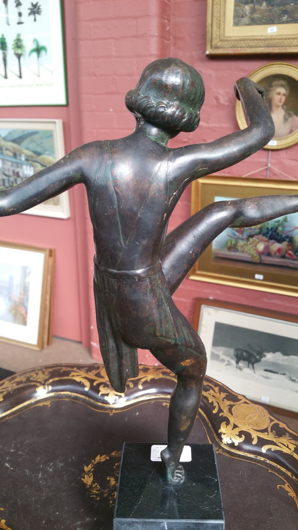 An Art Deco style spelter figure of a gymnast dancing with hoops balancing on one leg, - Image 2 of 4