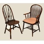 A set of four elm seated stick back chairs and a similar elbow chair (5).