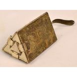 A 1930s metal triangular evening purse,