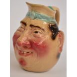 A c.1890 Sarreguemines Majolica large character jug of a "Jolly Fellow", height 22cm.