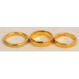 Three 22ct yellow gold wedding bands, approx 16.3g.