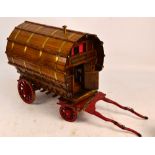 A scratch built model of a Romany Rose caravan, length 36cm, height 36cm.