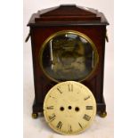 An early 19th century mahogany cased bracket clock, for restoration, the caddy top above circular