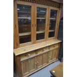 A large contemporary pine bookcase,