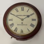 A late 19th century mahogany cased circular wall clock with painted dial inscribed "Edwards &