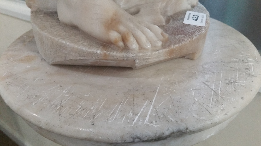 A late 19th/early 20th century carrara alabaster figure of a young fisherman modelled with a net - Image 12 of 15