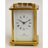 A cased contemporary brass cased carriage clock by Matthew Norman,