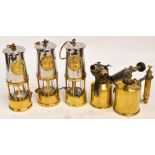 Three miner's lamps by The Protector Lamp and Lighting Company Ltd, Eccles,