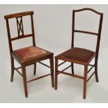 Two pairs of bedroom chairs.