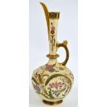 A large Royal Worcester blush ivory ewer with gilt heightening throughout and decorated with