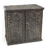 An unusual late 19th century Anglo-Indian ebonised table top cabinet,