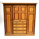 A late 19th century ash and mahogany combination wardrobe,