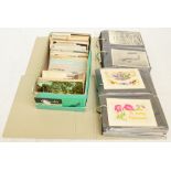 A collection of postcards to two albums in a box, including WWI embroidered examples,
