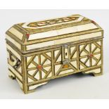 A decorative 20th century Moroccan bone and gem mounted twin handled casket,
