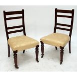 A set of six late Victorian mahogany dining chairs on turned faceted supports.