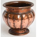 RICHARD LLEWELLYN BENSON RATHBONE (1864-1939); a small Arts and Crafts hammered copper jardinière of
