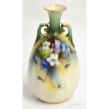 A Royal Worcester lobed ovoid vase with twin scroll handles, James Hadley shape 154, painted with