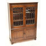 A Jaycee oak bookcase/display cabinet,