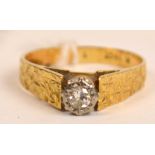 An 18ct gold single stone diamond ring, the diamond weighing approx 0.