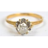 An 18ct yellow gold diamond solitaire, the brilliant cut stone in high claw mount, of approx 0.45ct.