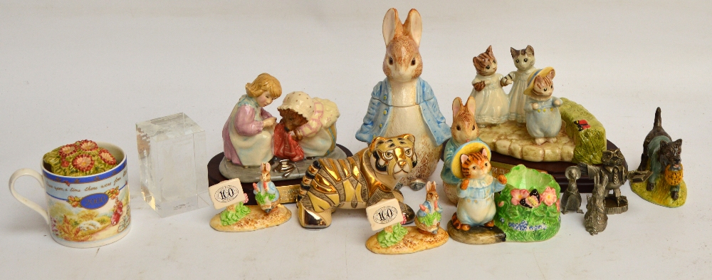 Two Beswick Beatrix Potter figure groups on plinths; "Mrs Tiggywinkle and Lucie", and "Mittens,
