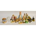 Two Beswick Beatrix Potter figure groups on plinths; "Mrs Tiggywinkle and Lucie", and "Mittens,