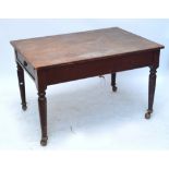 A Victorian stained pine rectangular single drawer kitchen table on turned tapering supports,