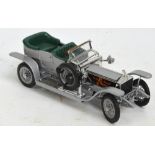 A diecast model of a 1907 Rolls Royce Silver Ghost, a scale of 1:24 by Franklin Mint, length 19cm.