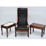 A Victorian mahogany framed high backed elbow chair on ring turned front legs,