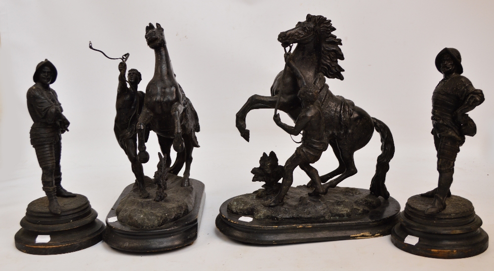 A pair of early 20th century spelter models of horses (af) and a pair of spelter soldiers (4).