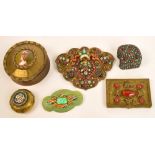 An early 20th century French circular brass trinket box set with transfer decorated porcelain