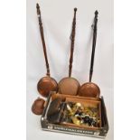 Three copper warming pans, a copper posser head,