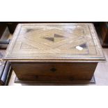 An Edwardian oak and inlaid trinket box with lift out tray and two drawers to the front, width 40cm.