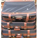 Three matching Samsonite canvas and leather bound suitcases (3).