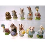 Ten Royal Albert and Beswick Beatrix Potter figurines; Tom Kitten, Miss Moppet, Old Mr Pricklepin,