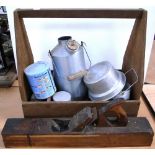 A large wooden plane, a homemade bottle carrier, a Kelly kettle etc.