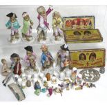 A late 19th early 20th century Continental porcelain eight piece monkey band figure group (all af)