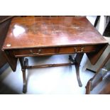 A reproduction mahogany sofa table with ring turned stretcher,