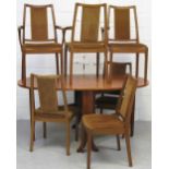 A retro teak drop leaf dining table,