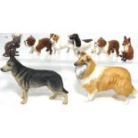 Eight assorted Beswick animal figurines to include six dogs, a mouse and a fox,