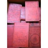 A collection of Ward Lock & co maps with red pictorial bindings.