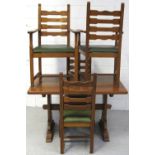 A 20th century oak dining suite comprising a refectory style table of small proportions,