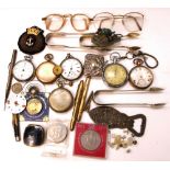 A collectors lot comprising various base metal pocket watches, a silver plated vesta case,