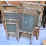 Four vintage wooden and glass washboards of various sizes (4).