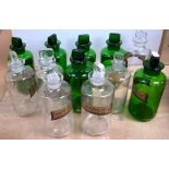 Six modern green tinted glass chemist jars and six similar clear glass examples (12).